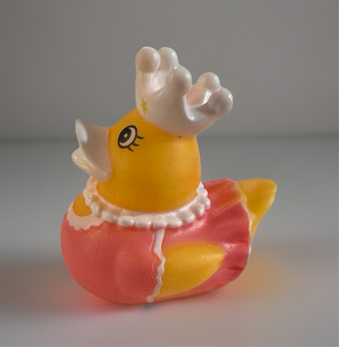 2 inch princess duck toy wearing a white crown and pink dress from Reed’s Rubber Ducks and Sensory Shop