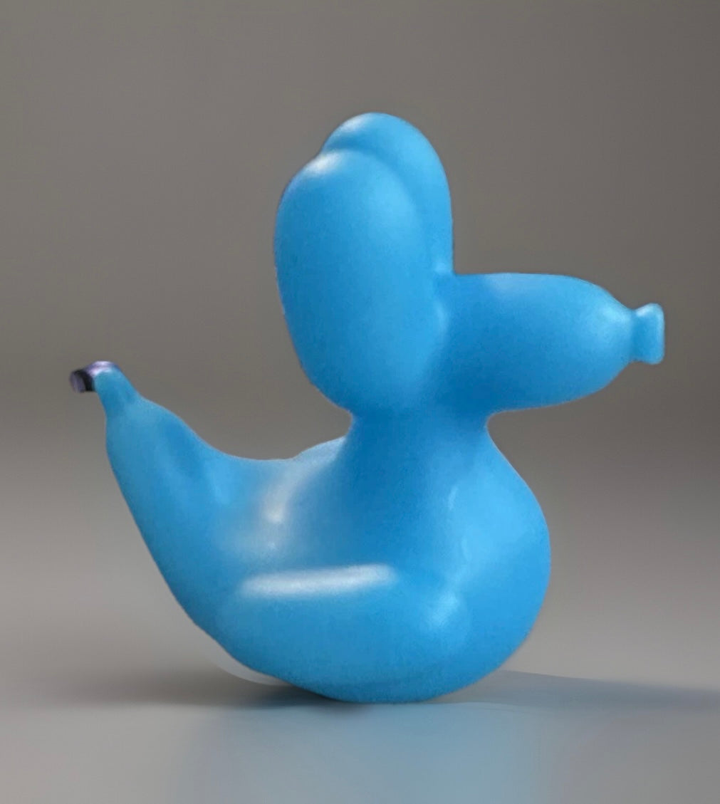 Blue balloon animal rubber duck from Reed’s Rubber Ducks and Sensory Shop with smooth surface