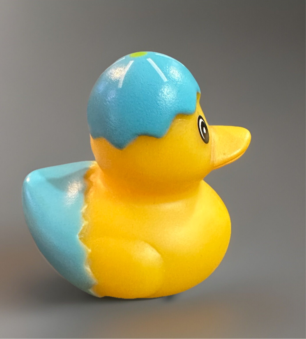 Blue Easter egg rubber duck with a bright yellow body, perfect for festive celebrations