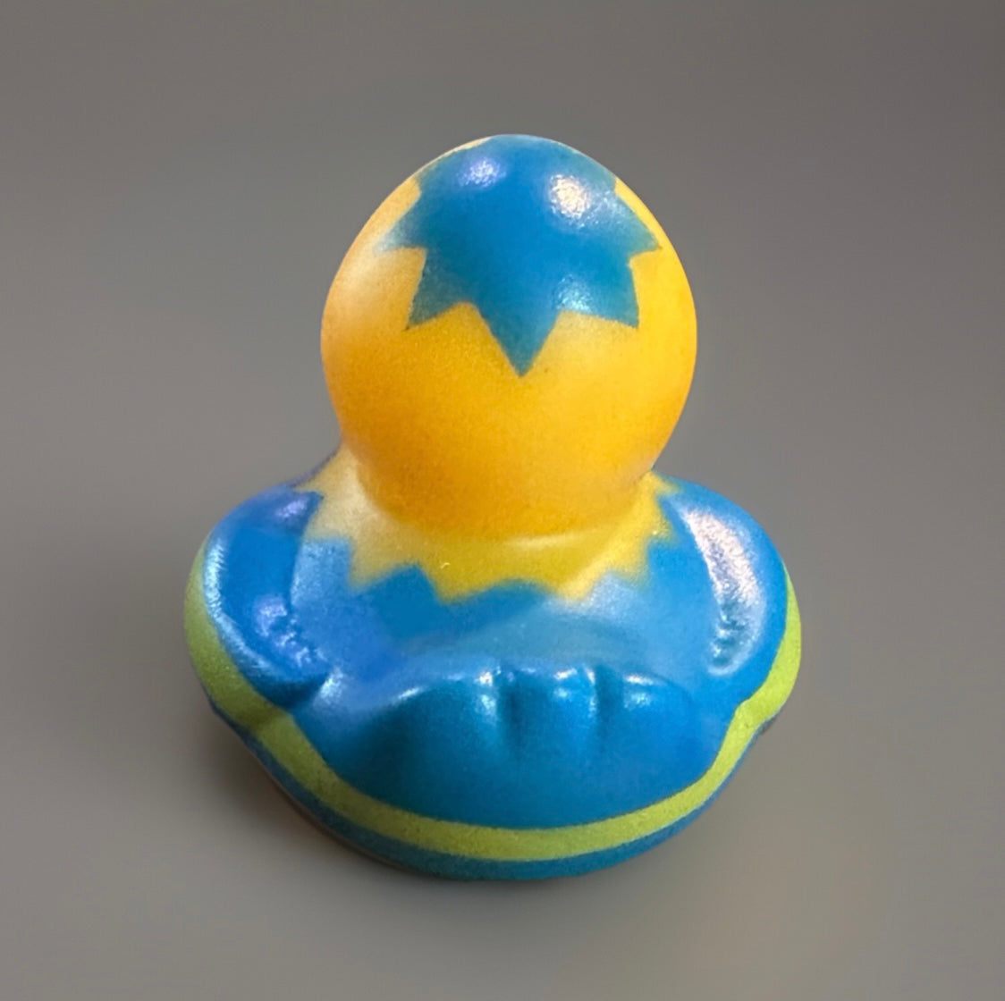 Blue Yellow Easter Rubber Duck with bright colors and festive design from Reed’s Rubber Ducks and Sensory Shop
