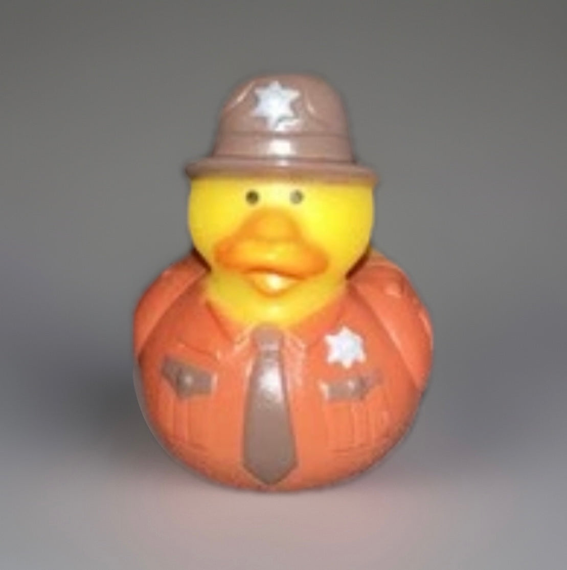 Deputy rubber duck toy wearing brown sheriff uniform and hat with silver star badges