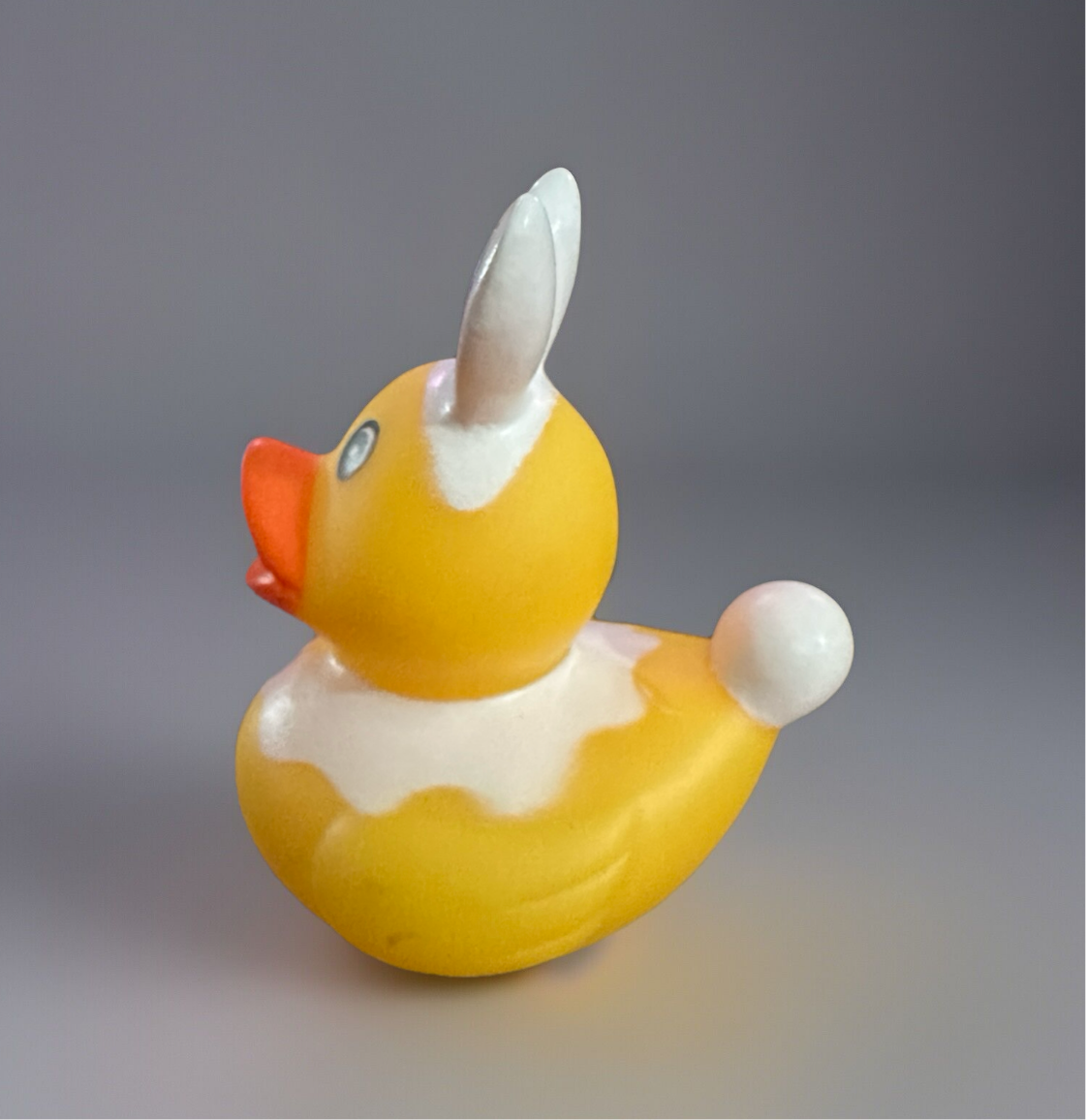 Easter bunny rubber duck with white bunny ears and tail from Reeds Rubber Ducks and Sensory Shop