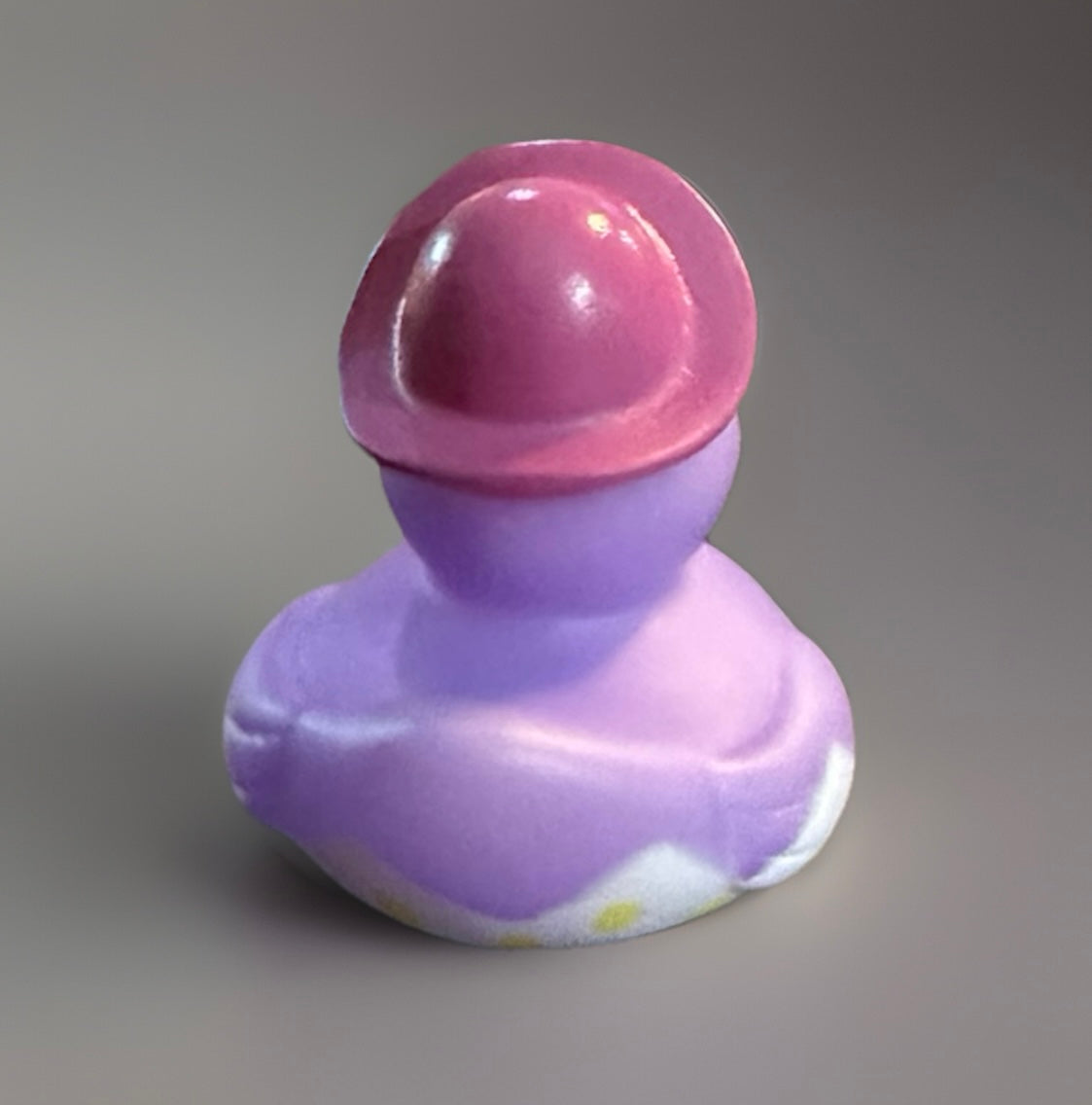 Purple Easter egg rubber duck gift wearing a pink hat from Reed’s Rubber Ducks and Sensory Shop