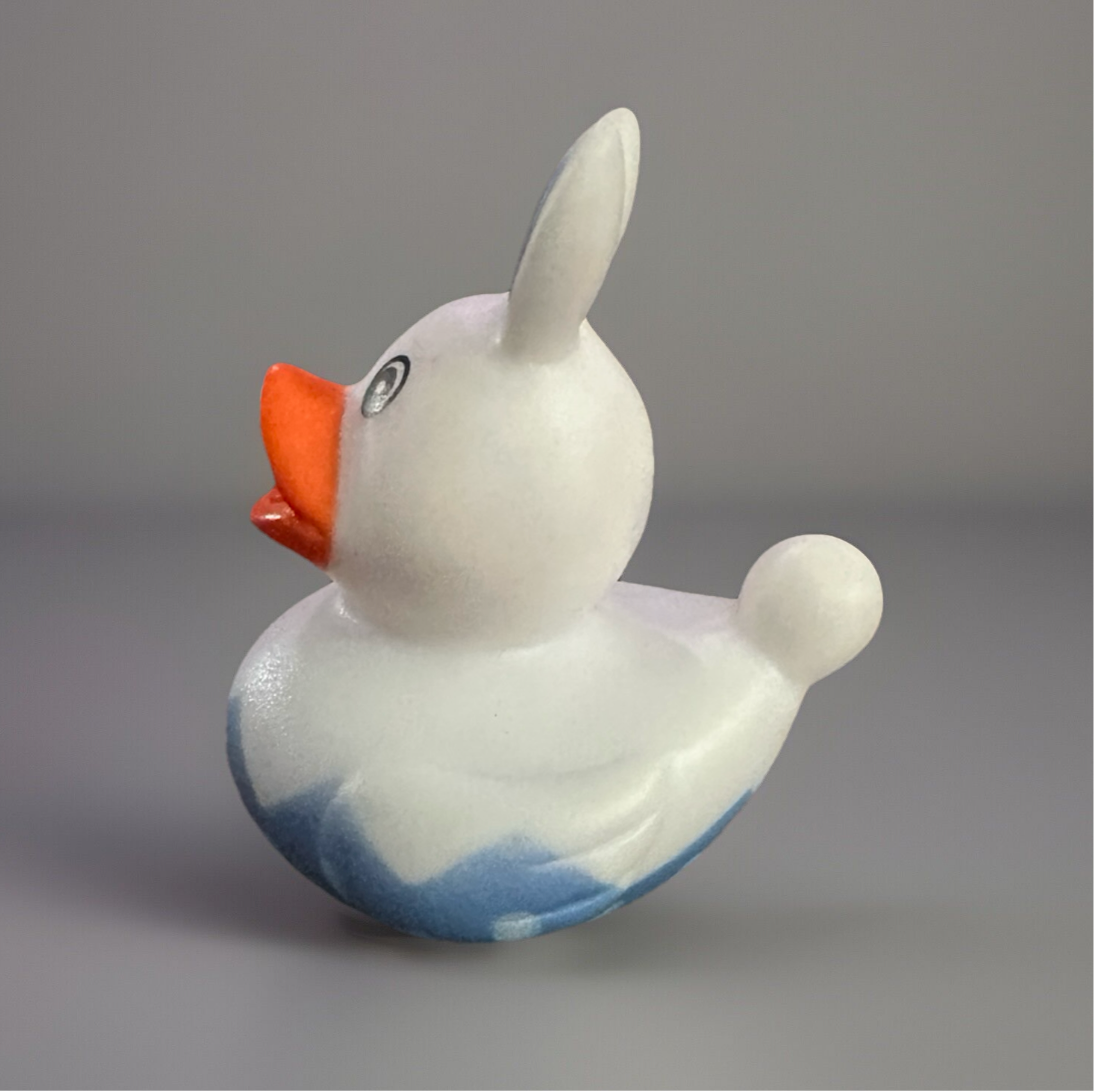 Easter gift rubber duck featuring a cute design with ears and a colorful body