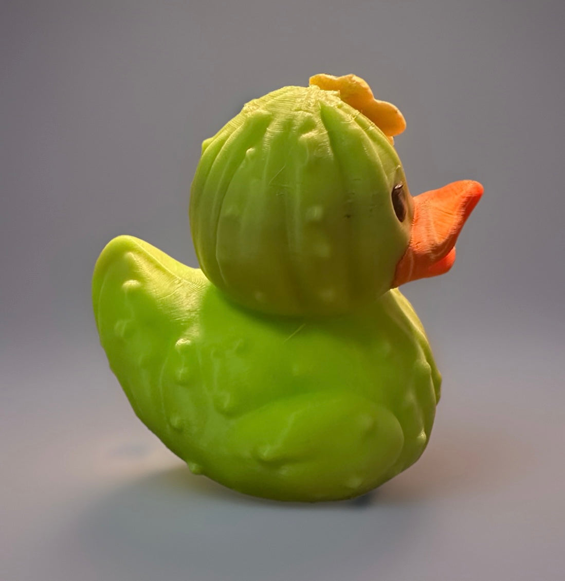 Reed’s Rubber Ducks and Sensory Shop 3D printed cactus duck in bright green with an orange beak