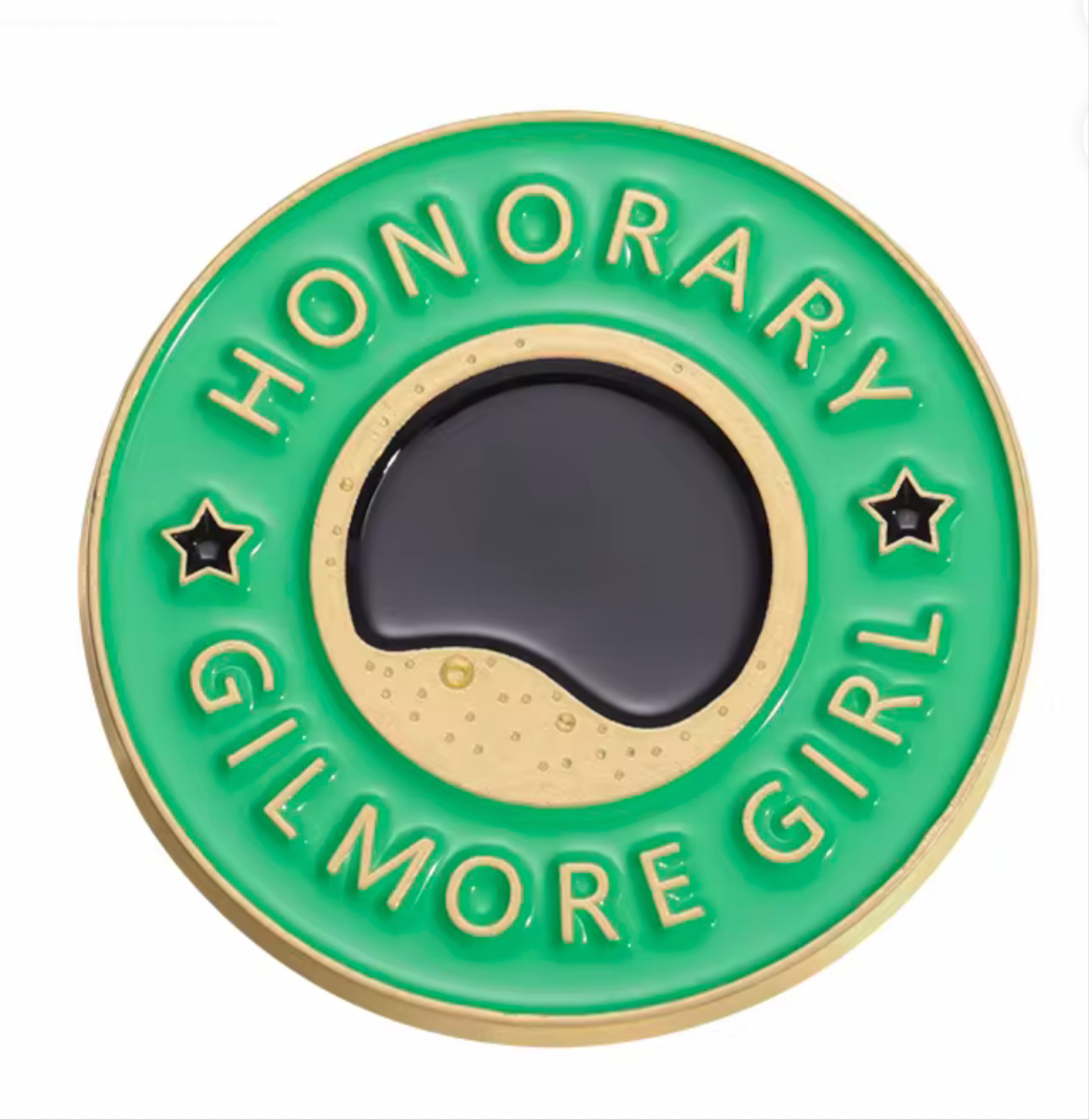 Gilmore Girls coffee pin featuring a green circular design with Honorary Gilmore Girl text