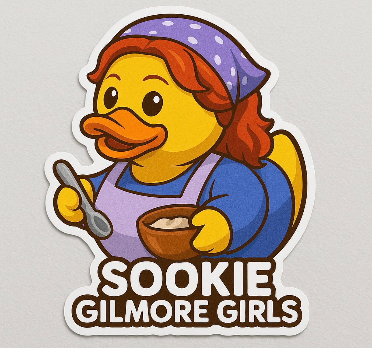 Gilmore Girls rubber duck sticker featuring Sookie with a spoon and bowl in purple headscarf and apron
