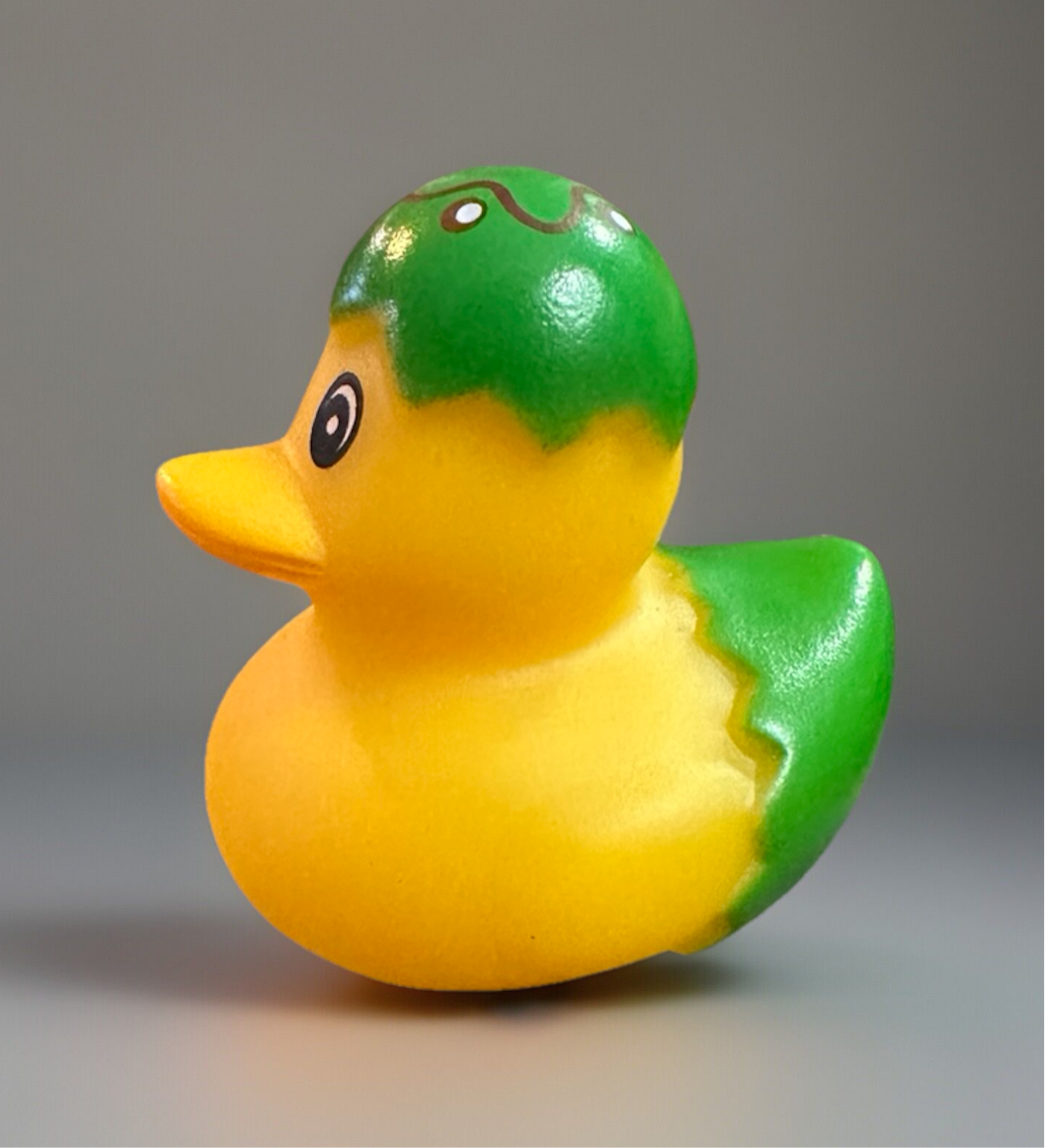Green Easter egg rubber duck in yellow and green colors, perfect for springtime celebrations