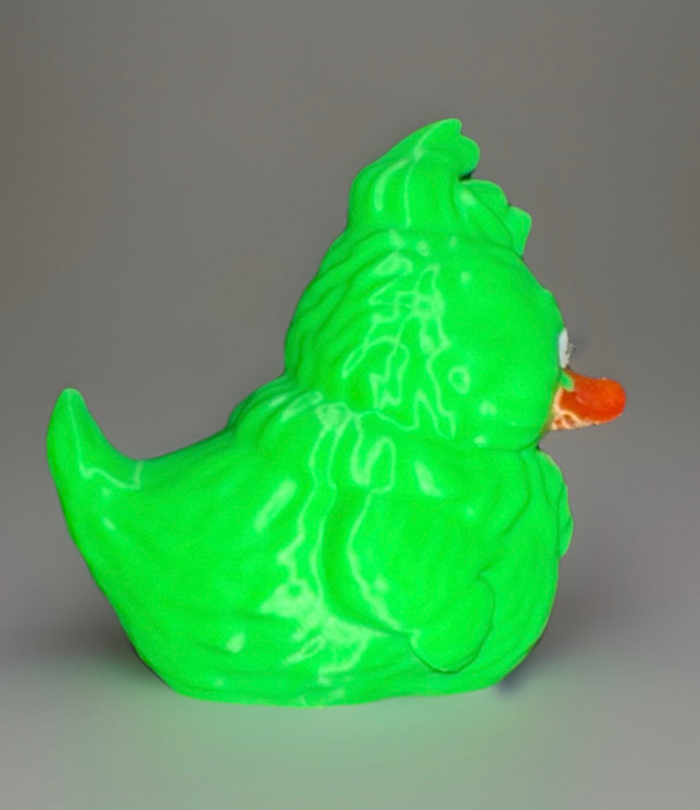 Bright green Grinch theme duck rubber toy with an orange beak and detailed textured design