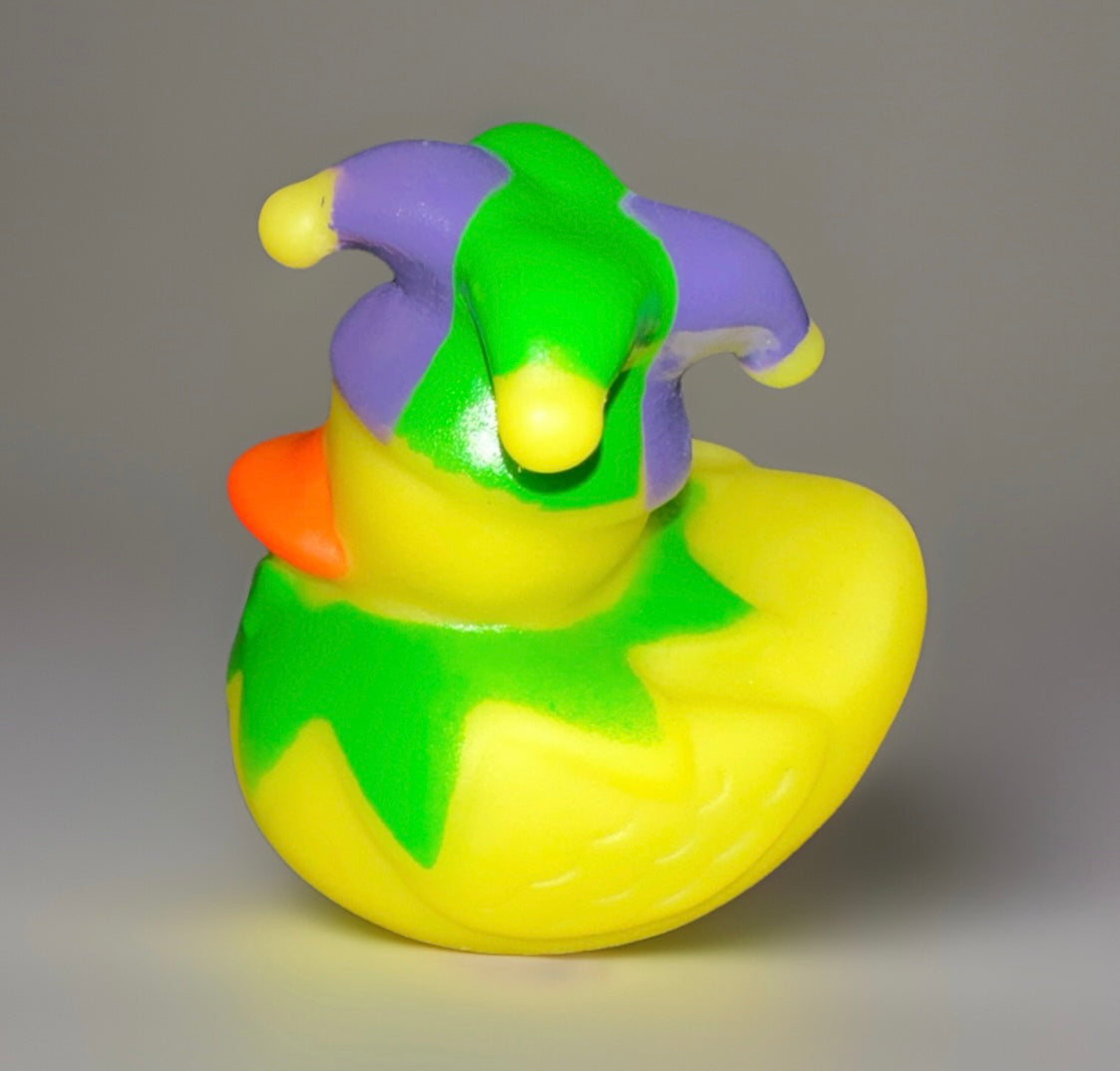 Yellow Mardi Gras rubber duck wearing a green and purple jester hat by Reed’s Rubber Ducks