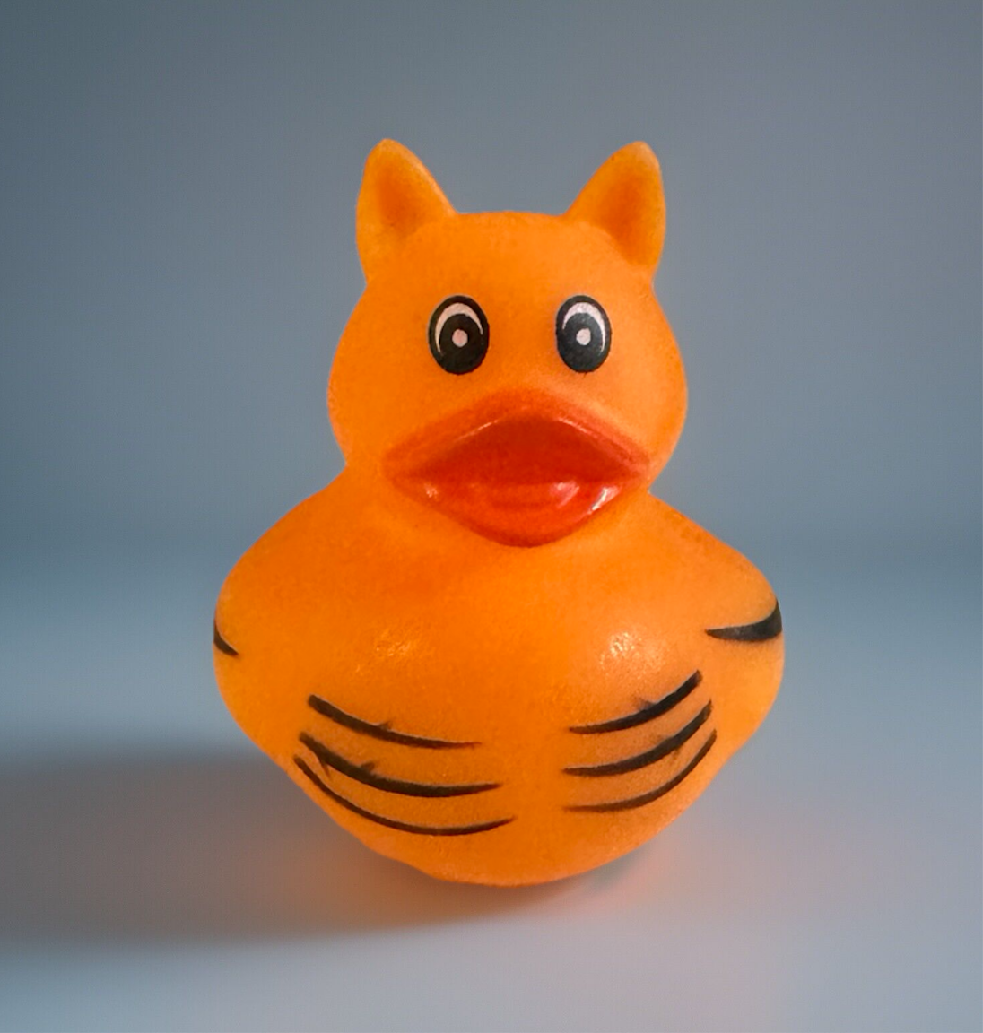 Orange tiger rubber duck with black stripes and cat-like ears from Reed’s Rubber Ducks and Sensory Shop
