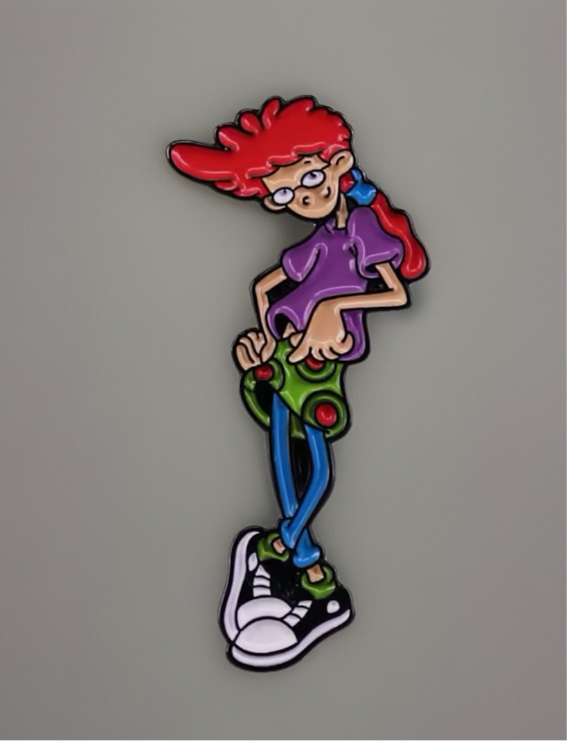 Colorful Pepper Ann lapel pin featuring the quirky character in a playful pose