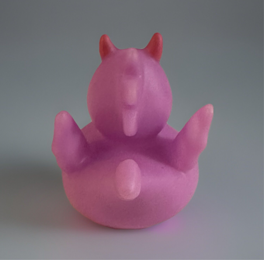 Pink heart dragon rubber duck with red horns from Reed’s Rubber Ducks and Sensory Shop