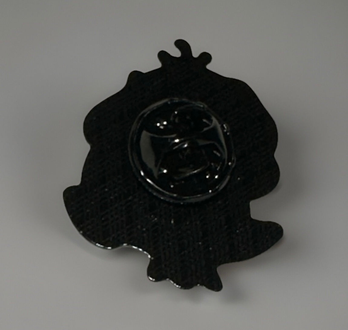 Black metal backing of a Pokemon Psyduck lapel pin from Reed’s Rubber Ducks and Sensory Shop