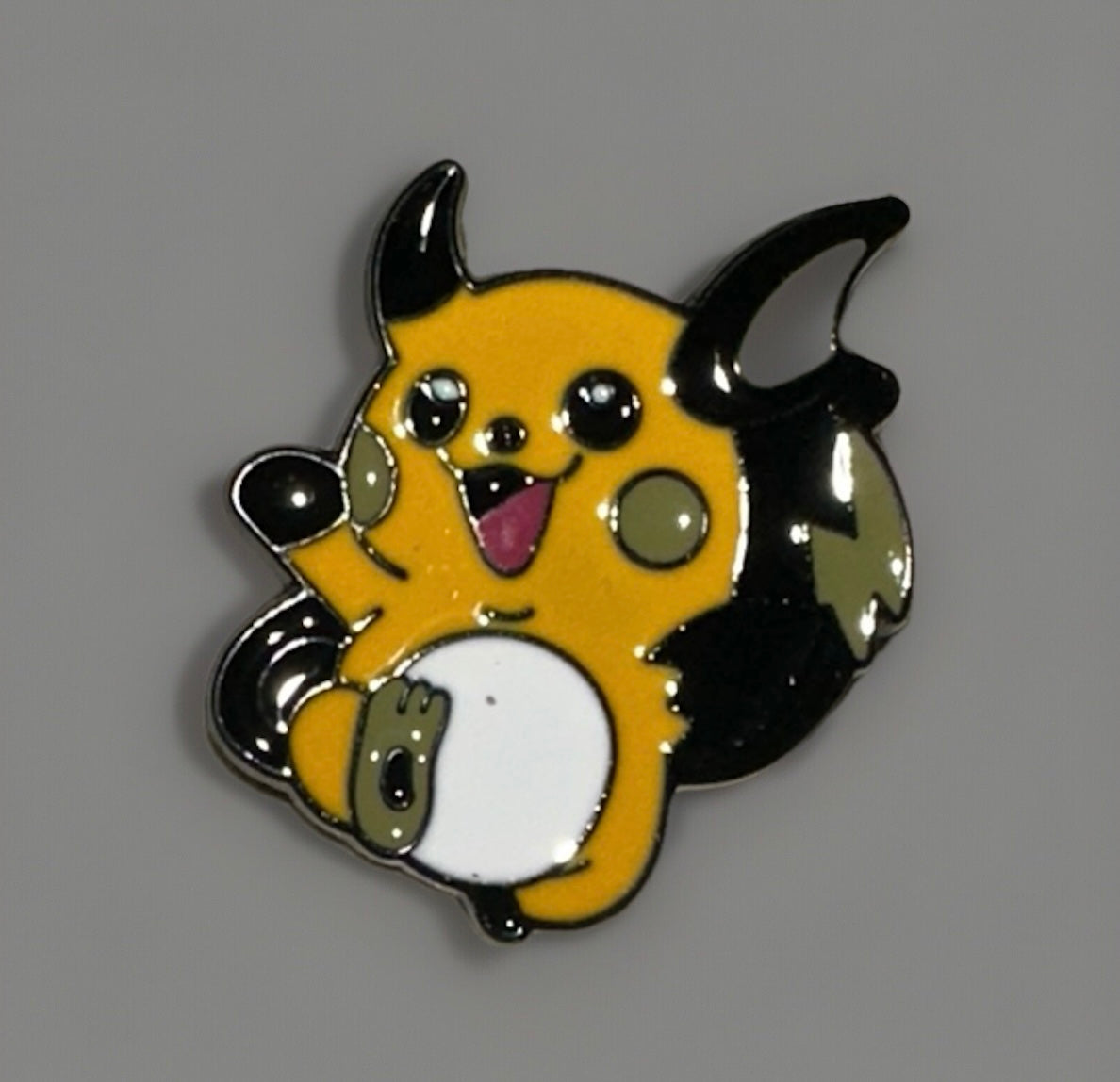 Pokemon Raichu Lapel Pin features a cheerful Raichu character, perfect for backpacks and hats