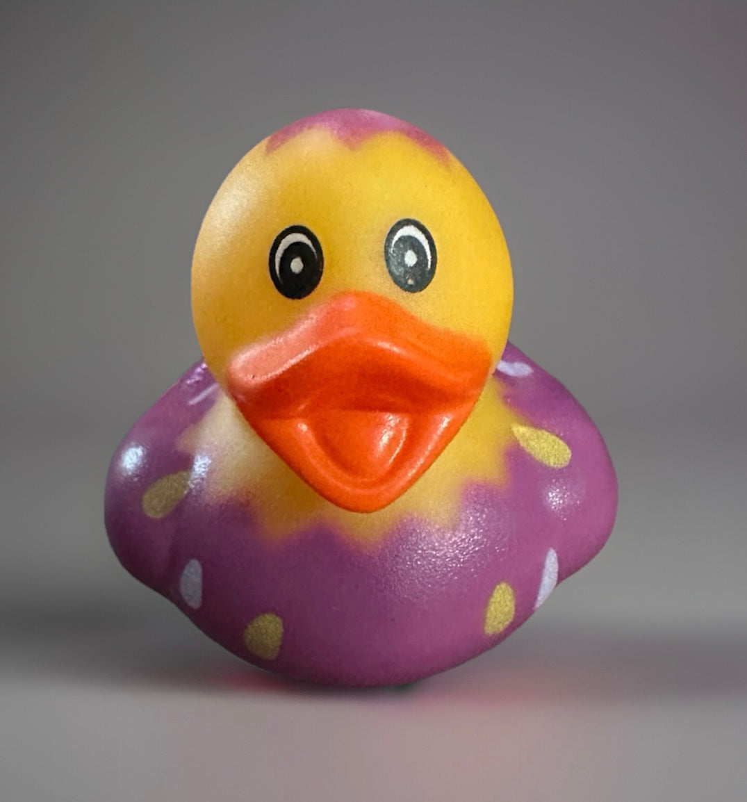 Purple Easter egg rubber duck with yellow spots and orange beak from Reed’s Rubber Ducks and Sensory Shop