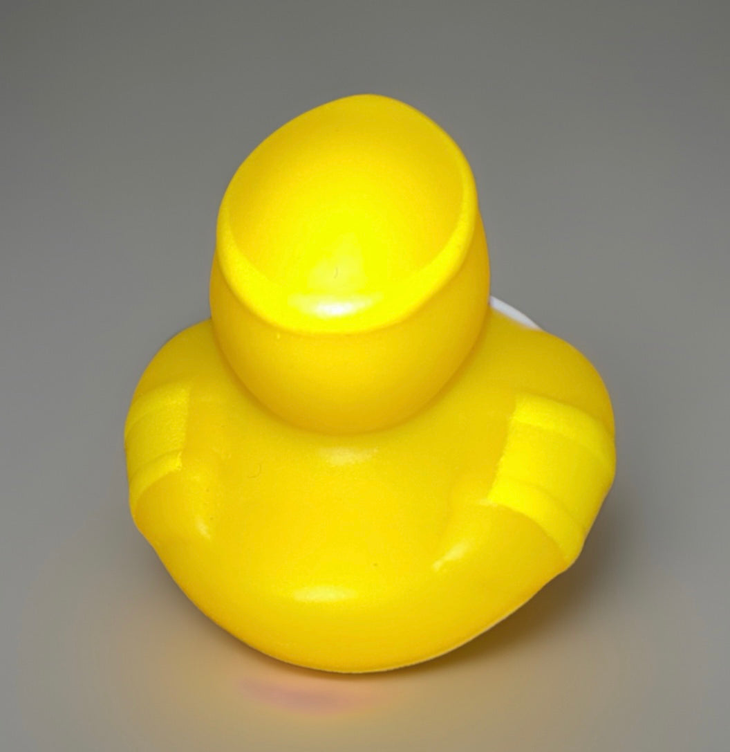 Yellow superhero girl rubber duck from Reed’s Rubber Ducks and Sensory Shop with detailed arm bands