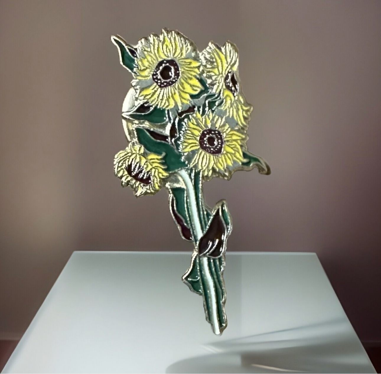 Van Gogh enamel pin featuring yellow sunflower bouquet with green stems and leaves