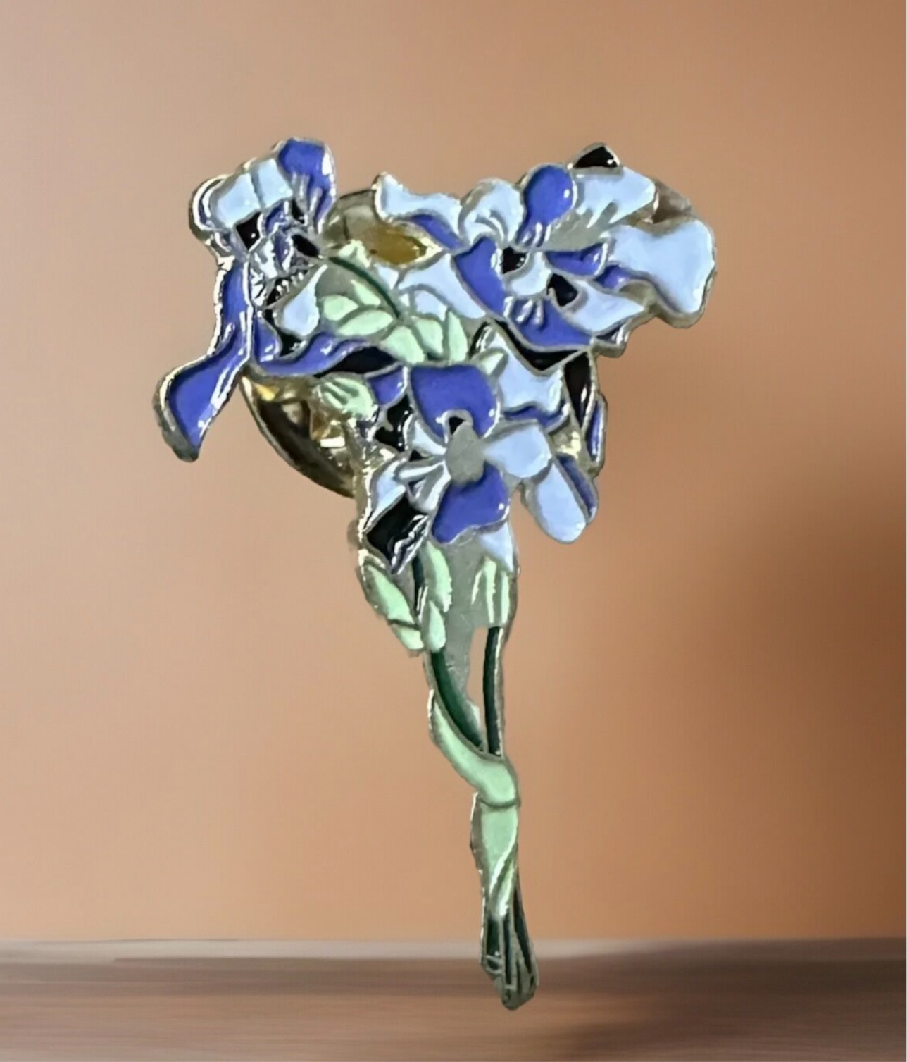 Van Gogh Iris pin featuring detailed blue and green enamel floral design on gold backing