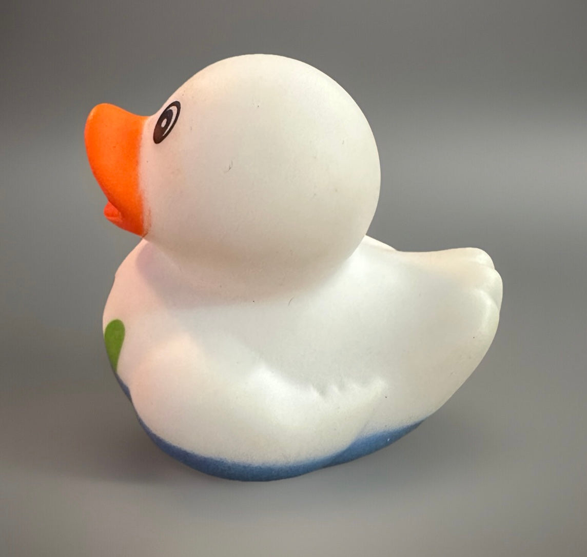 White Easter rubber duck with orange beak and blue base from Reed’s Rubber Ducks and Sensory Shop