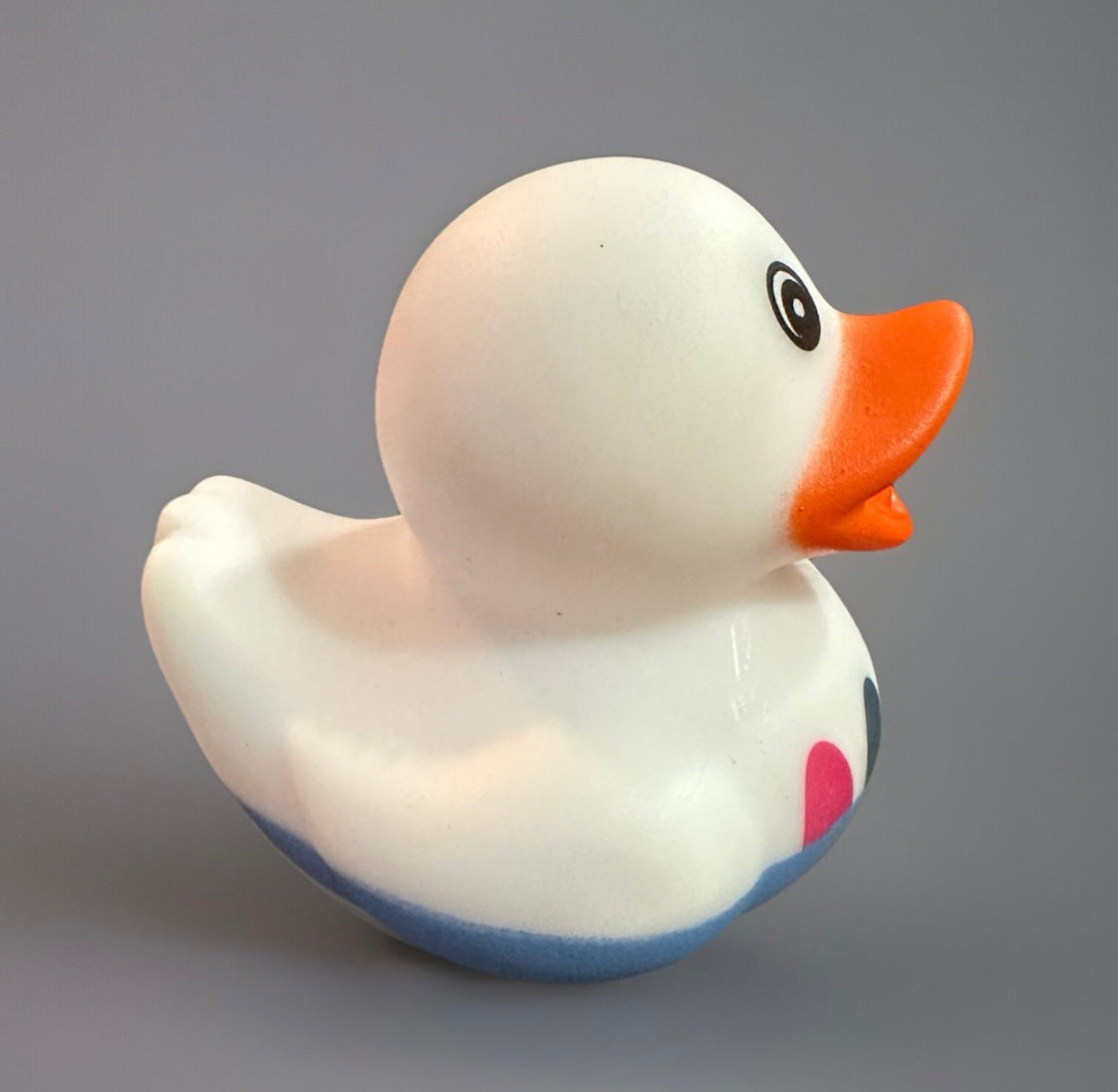 White Easter rubber duck with orange beak and blue base by Reeds Rubber Ducks and Sensory Shop