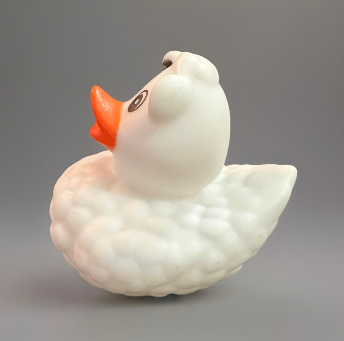 White sheep rubber duck with textured wool design and bright orange beak from Reed’s Rubber Ducks and Sensory Shop