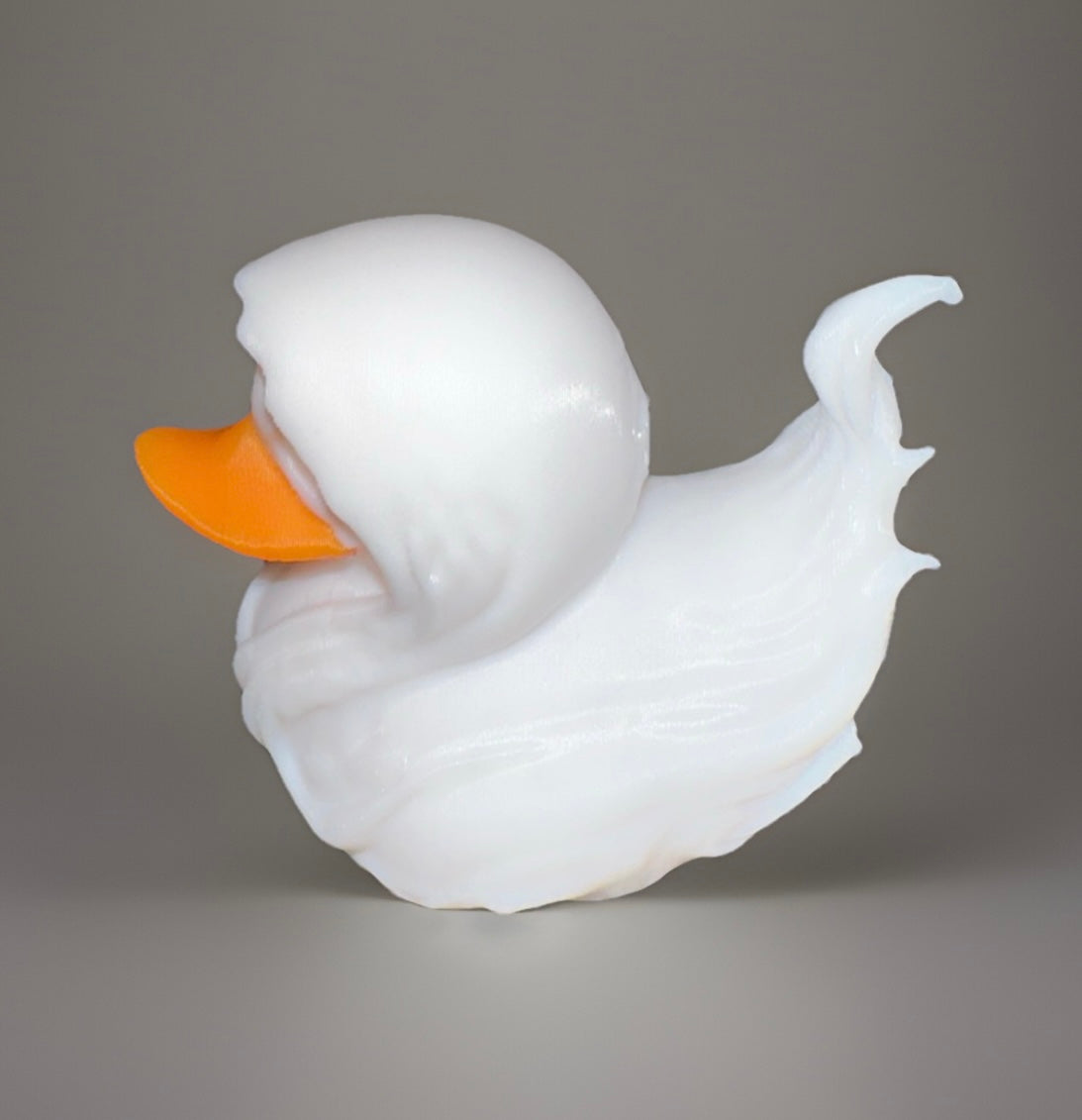 White 3D angel duck with orange beak from Reed’s Rubber Ducks and Sensory Shop