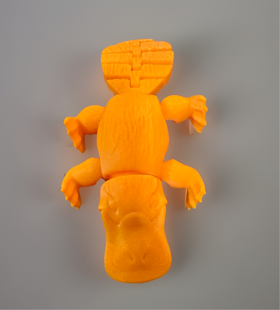 Orange 3D articulated fidget platypus toy from Reed’s Rubber Ducks and Sensory Shop