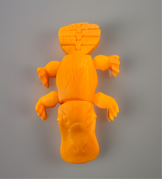 Orange 3D articulated fidget platypus toy from Reed’s Rubber Ducks and Sensory Shop