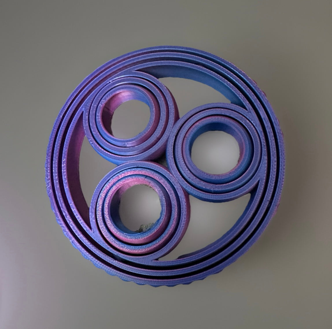 Purple and blue 3D fidget rings for sensory relief with textured spiral design from Reeds Rubber Ducks and Sensory Shop