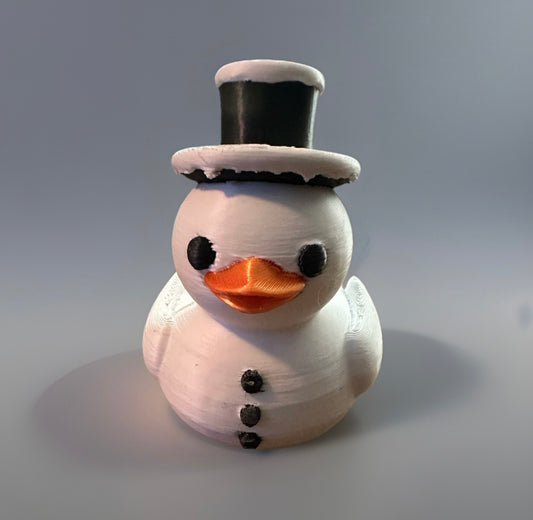 3D printed snowman duck with black top hat and orange beak by Reeds Rubber Ducks and Sensory Shop