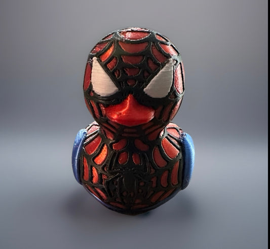 3D printed Spider-Man duck with detailed web pattern and white eyes from Reed’s Rubber Ducks and Sensory Shop