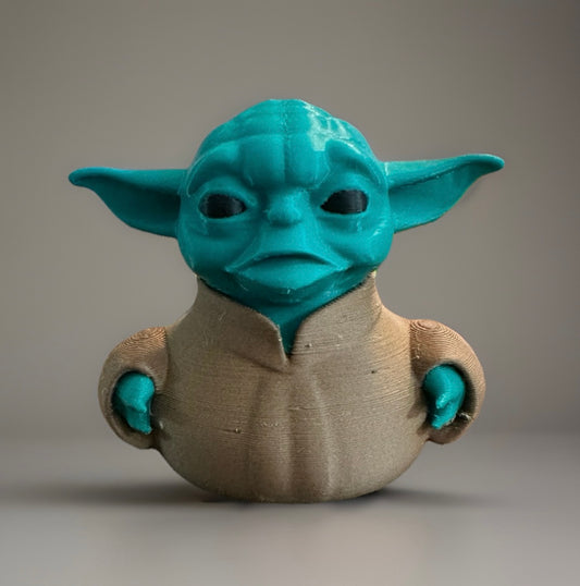 3D printed Yoda duck with green head and large ears wearing a brown robe from Reeds Rubber Ducks and Sensory Shop