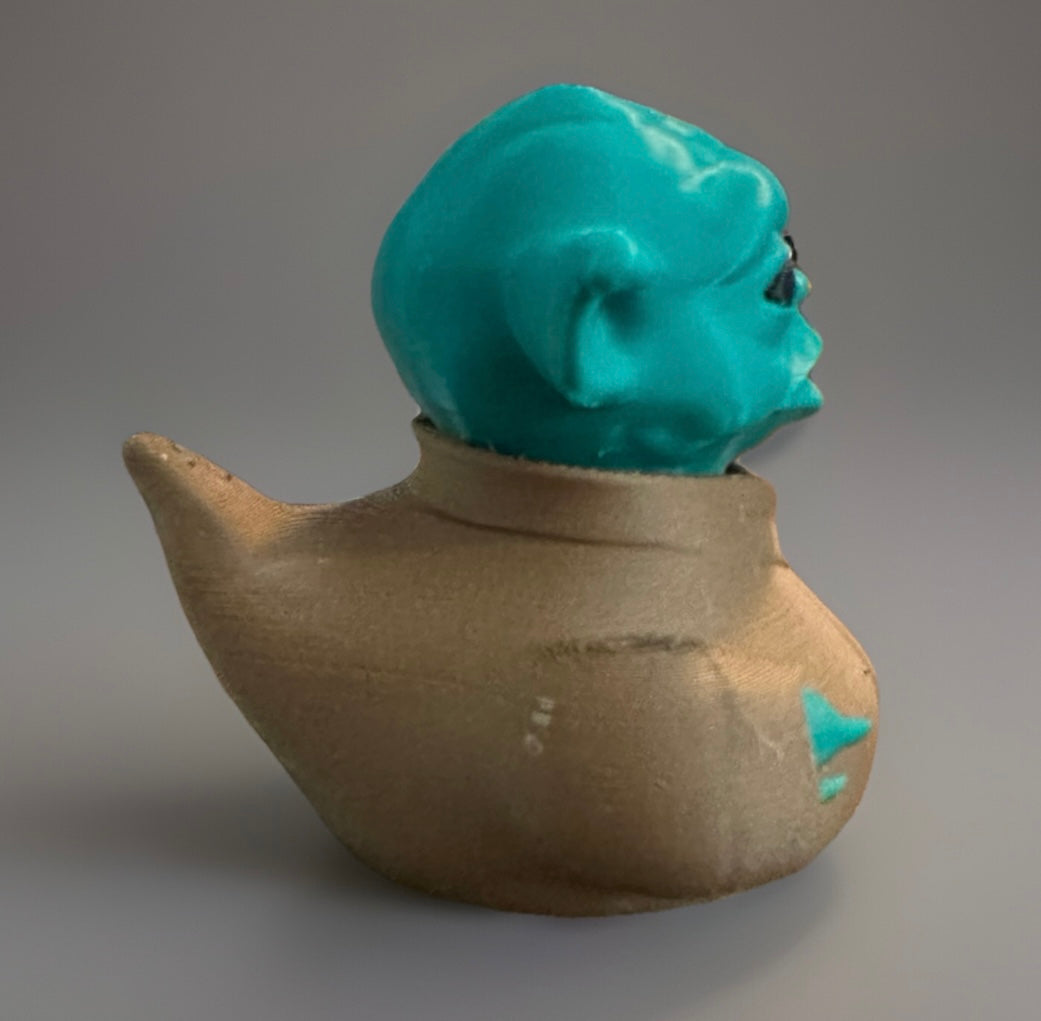 3D printed Yoda duck with green head and brown body from Reed’s Rubber Ducks and Sensory Shop