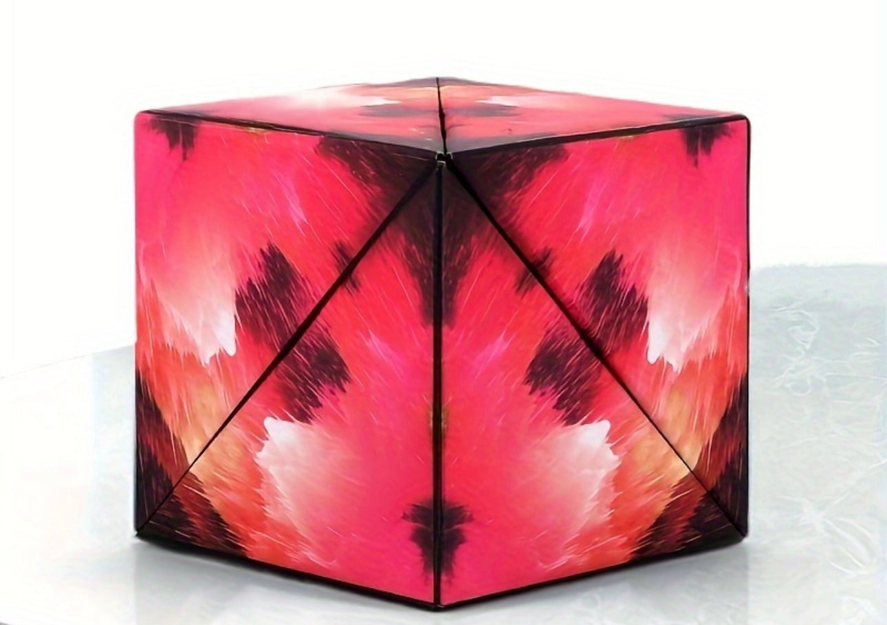 Reed’s Rubber Ducks 3D shifting magic cube with red and black abstract feather design