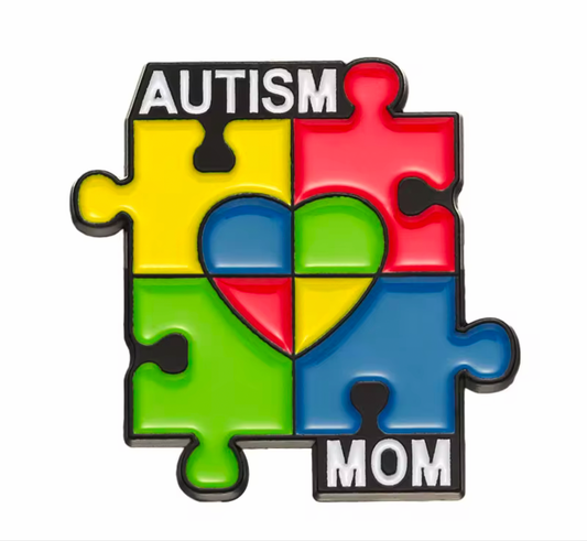 Colorful puzzle piece autism awareness mom lapel pin with heart design and bold letters