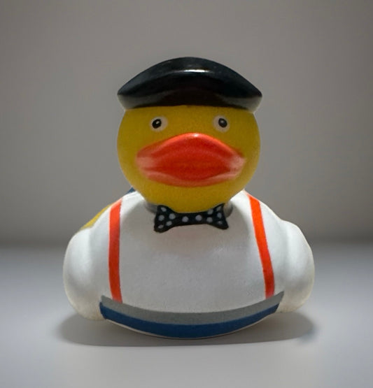 Bow tie rubber duck wearing a black hat red suspenders and white shirt from Reeds Rubber Ducks