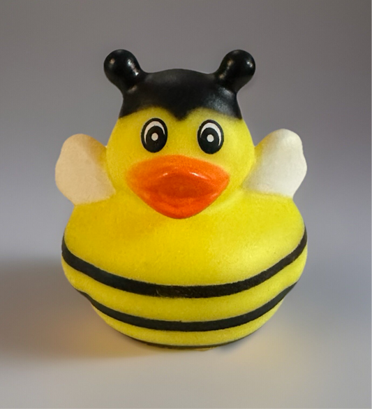 Bumble bee rubber duck toy with yellow and black stripes and orange beak by Reeds Rubber Ducks