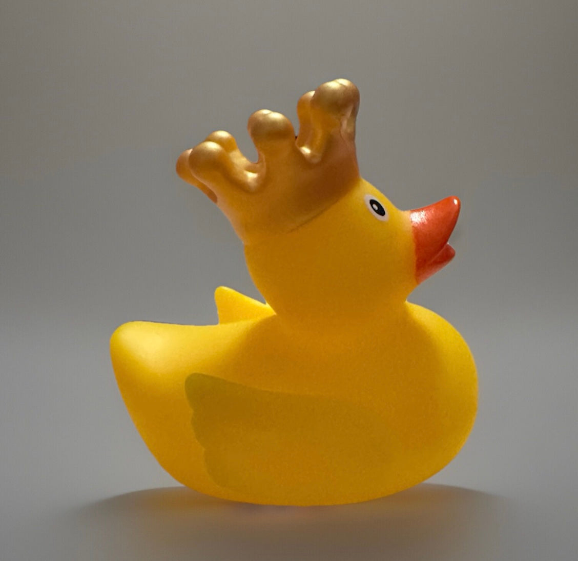 Yellow crowned rubber duck gift with a gold crown and bright orange beak from Reed’s Rubber Ducks and Sensory Shop