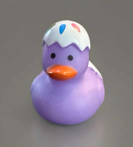 Purple Easter egg rubber duck with white cracked shell and colorful spots from Reeds Rubber Ducks