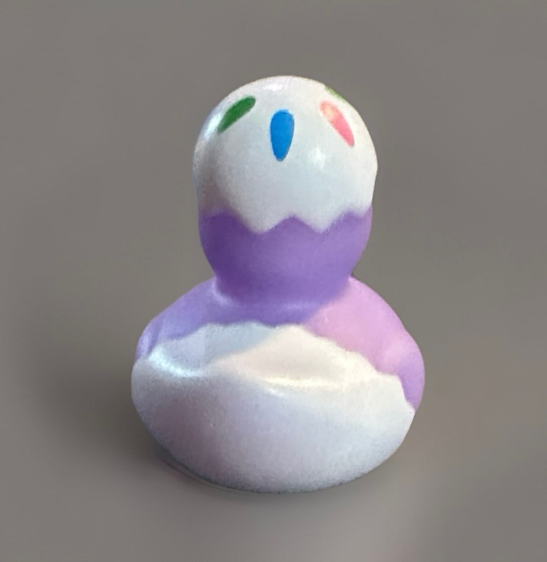 Purple and white Easter egg rubber duck with colorful spots from Reed’s Rubber Ducks and Sensory Shop