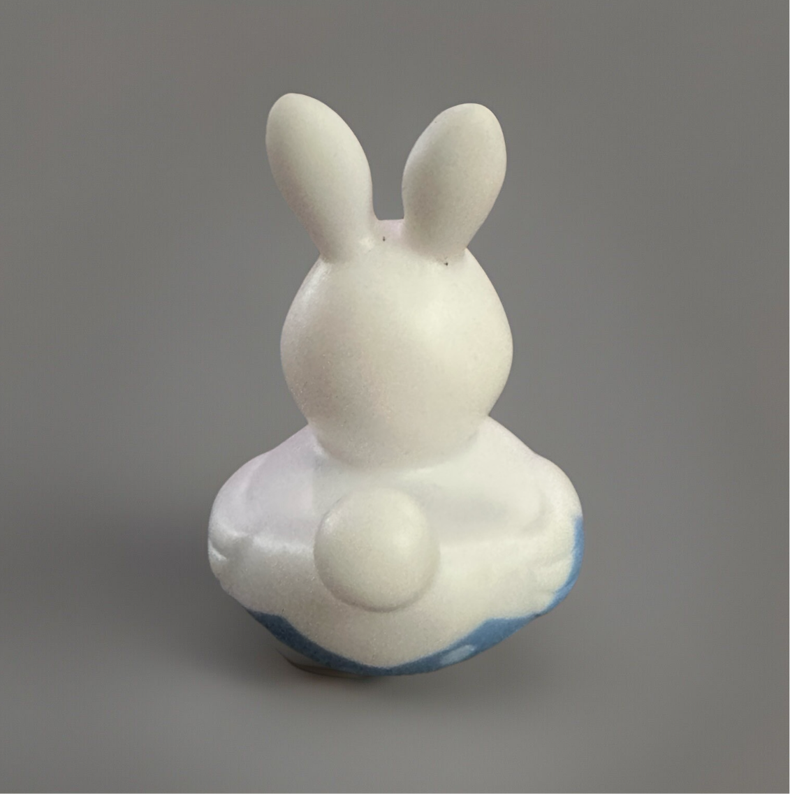 Cute bunny-shaped Easter gift rubber duck with soft colors for holiday celebrations