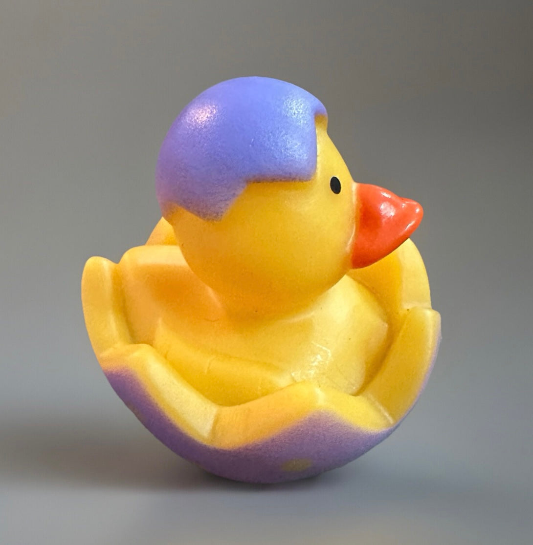 Yellow rubber duck hatching from purple eggshell Easter rubber duck gift from Reed’s Rubber Ducks