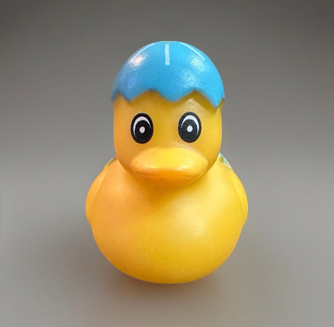 Yellow rubber duck with a blue eggshell hat Easter rubber duck gift from Reeds Rubber Ducks and Sensory Shop