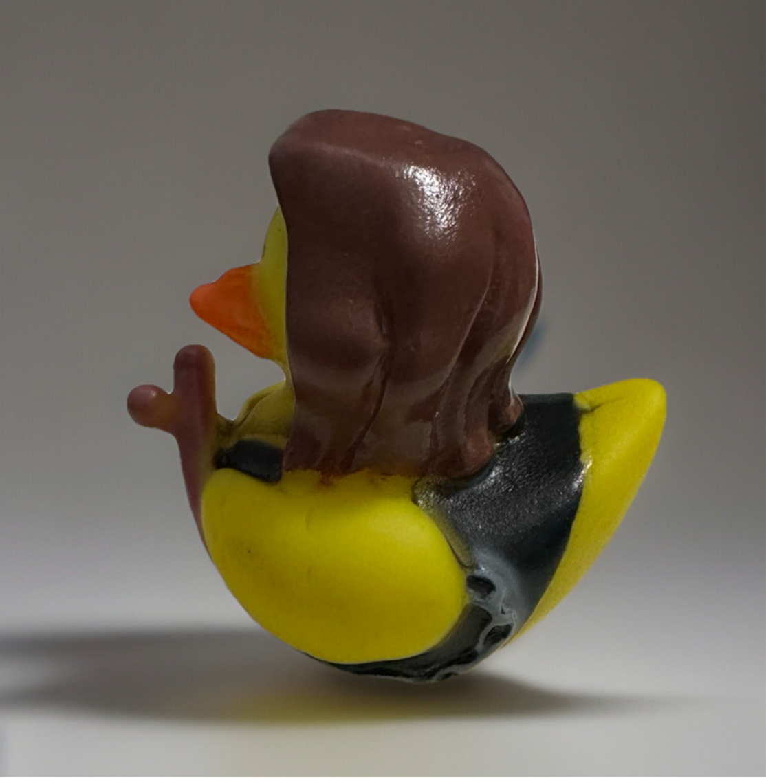 Rock and roll rubber duck with brown hair and black leather outfit from Reeds Rubber Ducks and Sensory Shop