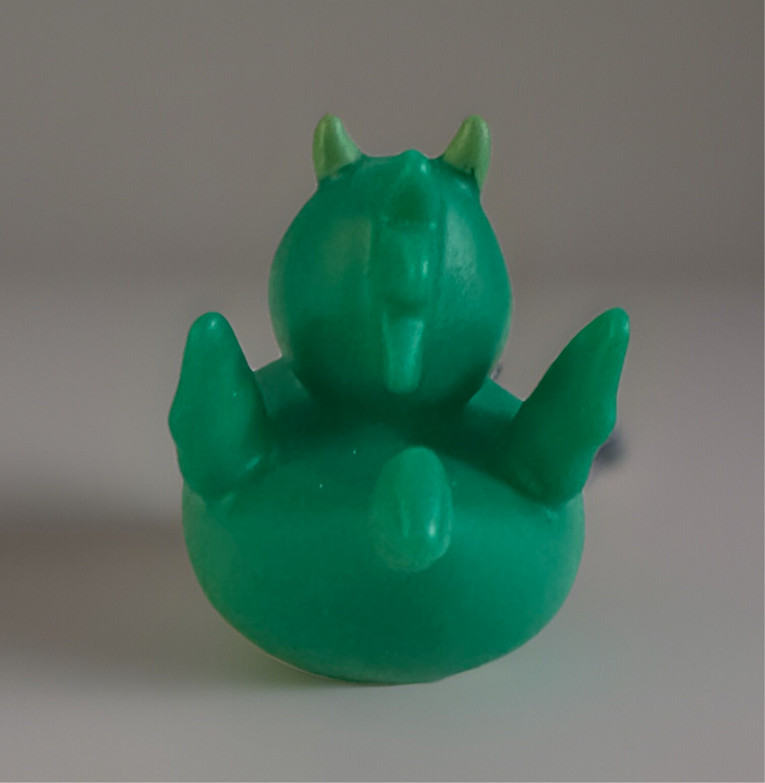 Green Dragon Rubber Duck from Reed’s Rubber Ducks and Sensory Shop shown from the back