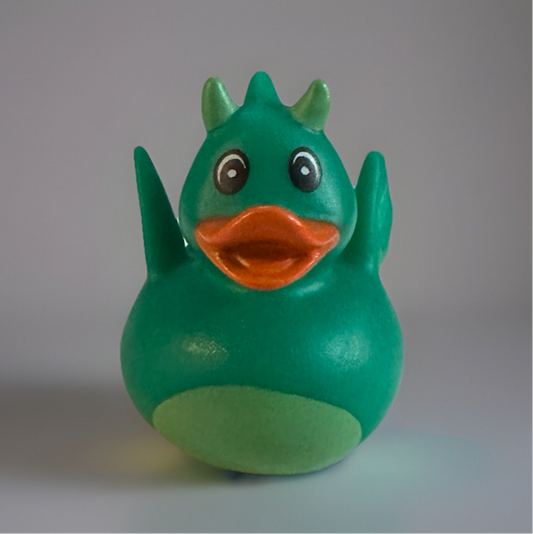 Green Dragon Rubber Duck with horns and orange beak from Reed’s Rubber Ducks and Sensory Shop