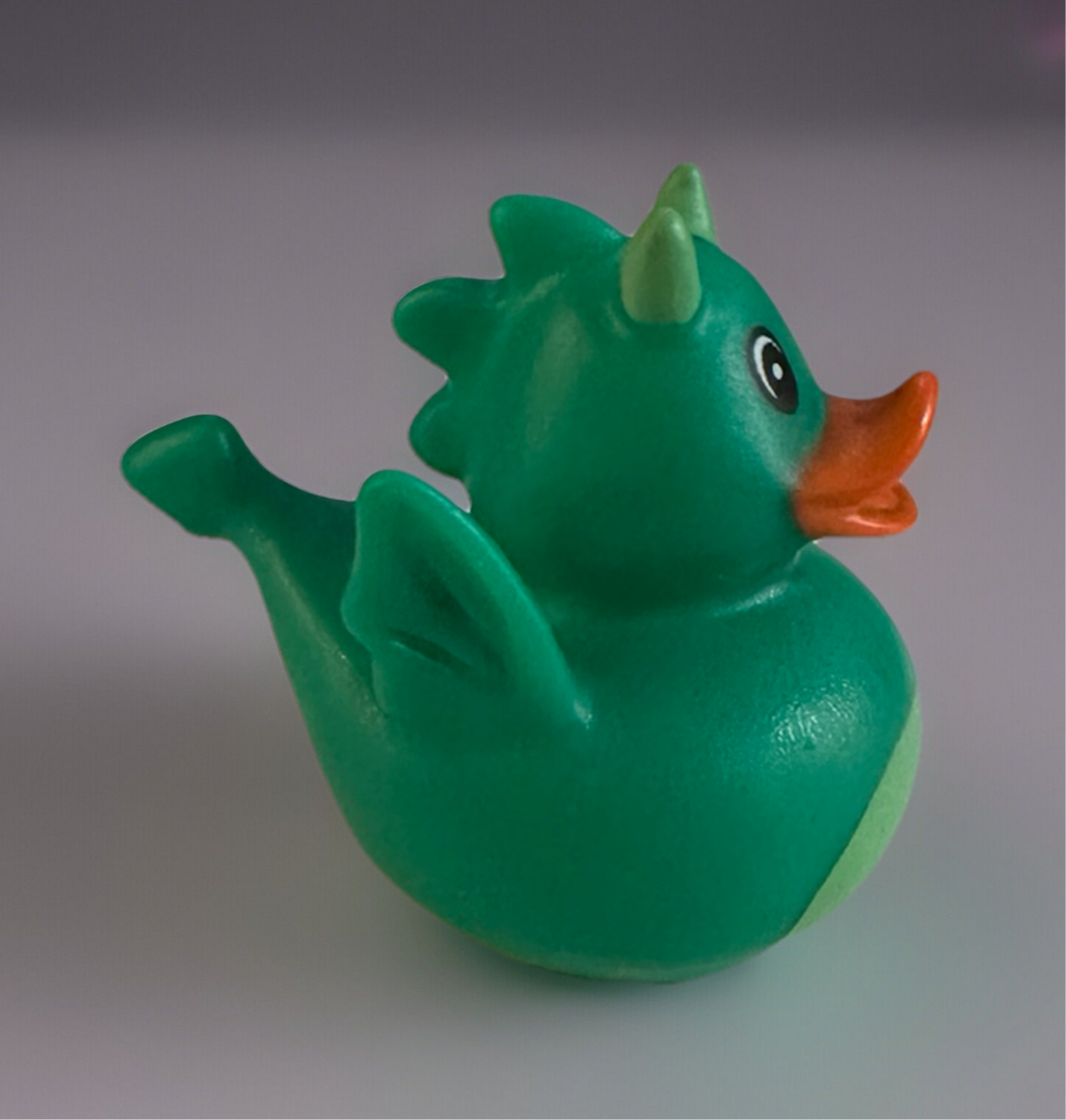 Green Dragon Rubber Duck with orange beak and small green horns from Reed’s Rubber Ducks and Sensory Shop