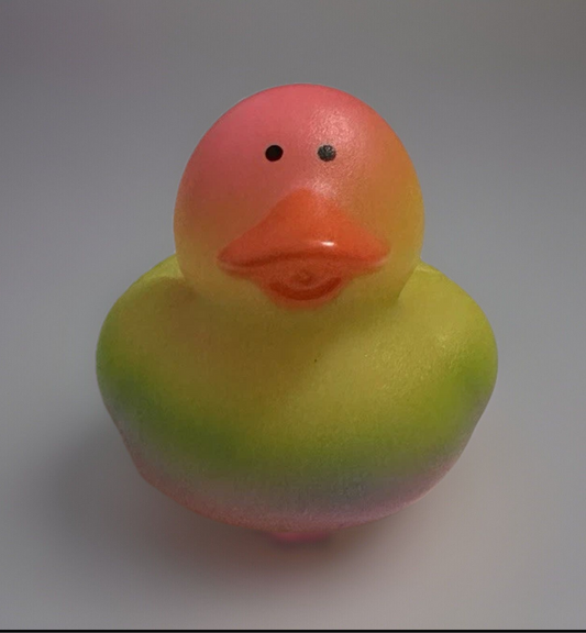 Reed’s Rubber Ducks and Sensory Shop multicolor rubber duck with pink, yellow, and green hues