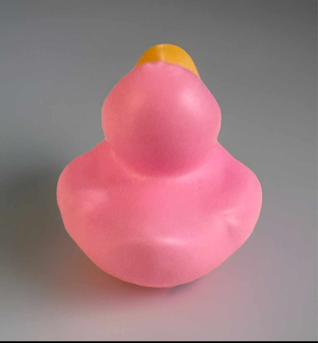 Pink rubber duck with hearts from Reed’s Rubber Ducks and Sensory Shop on gray background